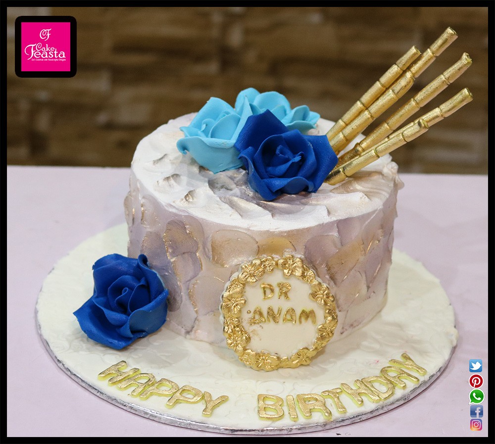 1575352786-blur-flowers-cream-birthday-cake.jpg