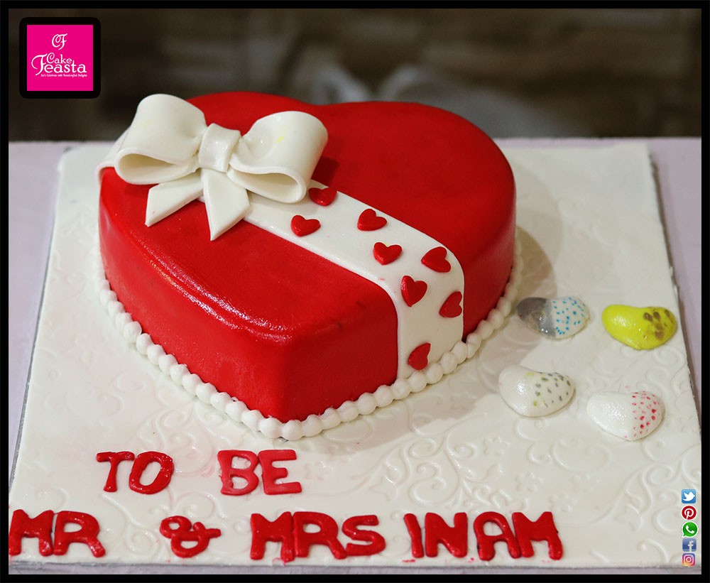 1575356157-red-heart-gift-anniversary-cake.jpg