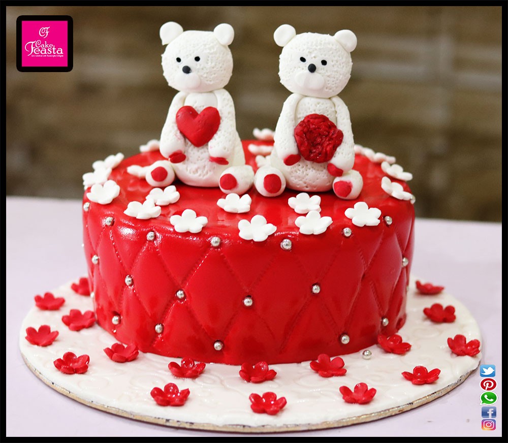 1575356298-white-bear-red-anniversary-cake.jpg
