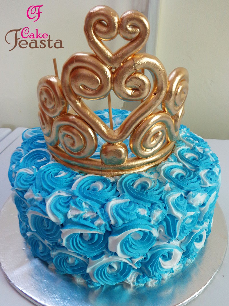 1575357083-crown-blue-flower-birthday-cake.jpg