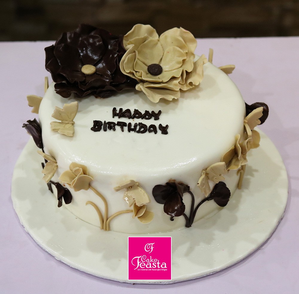 1575356936-black-golden-rose-birthday-cake.jpg